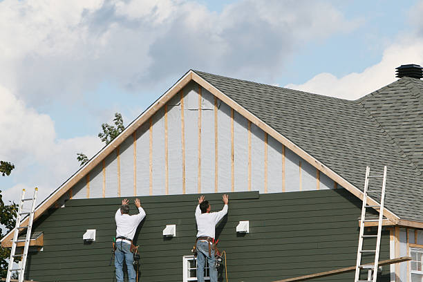 Professional Siding Installation technician working in Petersburg, PA